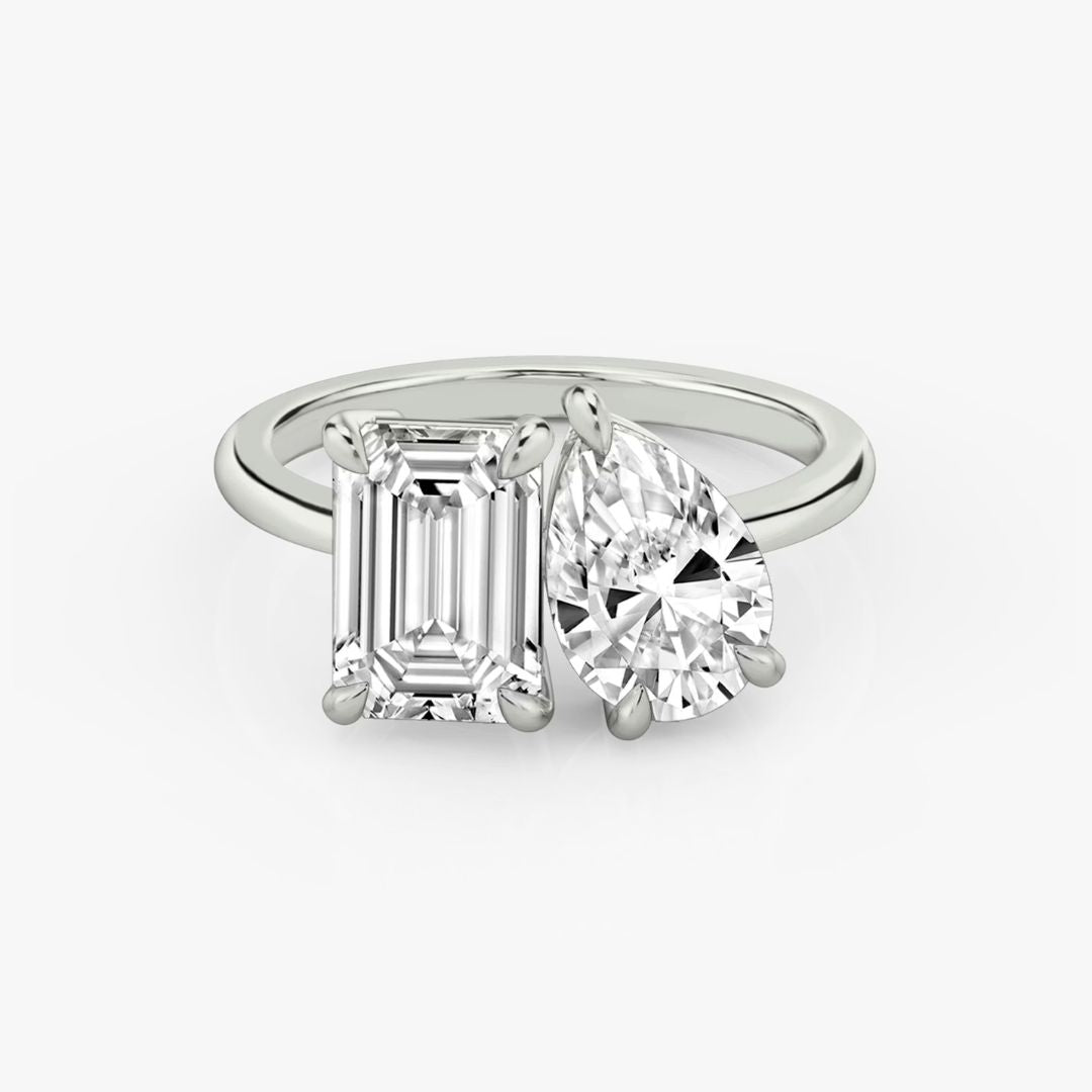 INSIEME  -  2CT & 1.5CT E VVS2 Toi et Moi Emerald and Pear Cut Engagement Ring