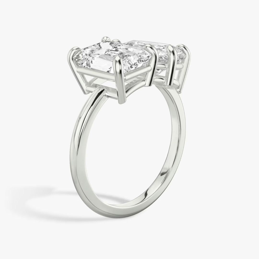 INSIEME  -  2CT & 1.5CT E VVS2 Toi et Moi Emerald and Pear Cut Engagement Ring