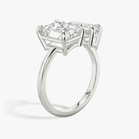 INSIEME  -  2CT & 1.5CT E VVS2 Toi et Moi Emerald and Pear Cut Engagement Ring