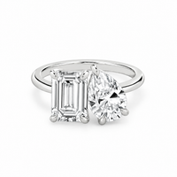 INSIEME  -  2CT & 1.5CT E VVS2 Toi et Moi Emerald and Pear Cut Engagement Ring