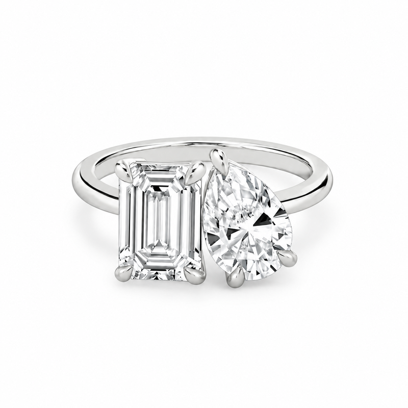 INSIEME  -  2CT & 1.5CT E VVS2 Toi et Moi Emerald and Pear Cut Engagement Ring